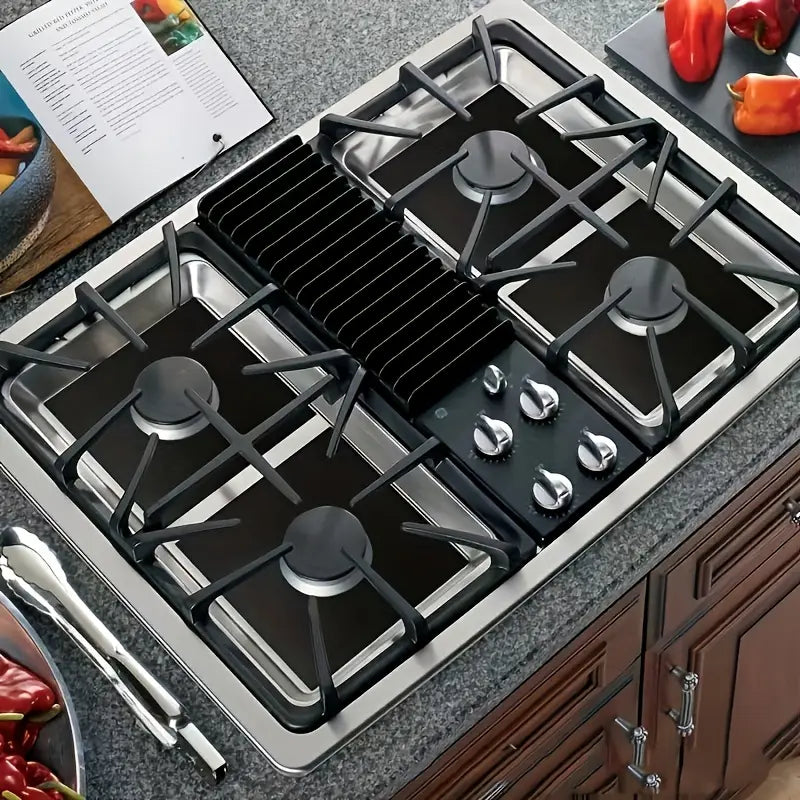 Gas stovetop fitted with burner liners